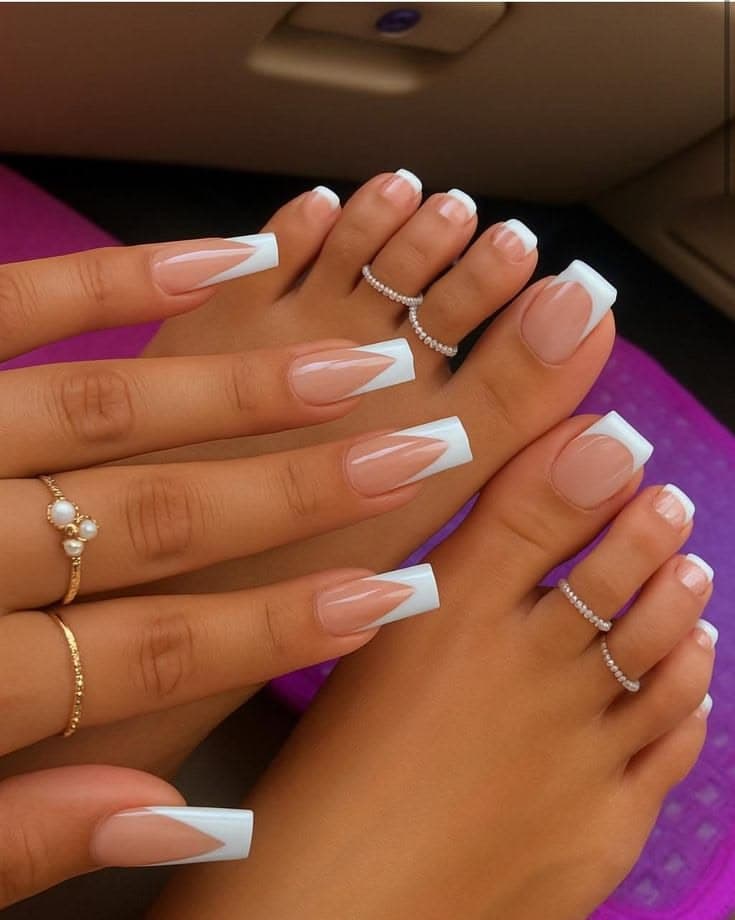 Classic French manicure and matching pedicure with V-tip white on natural base